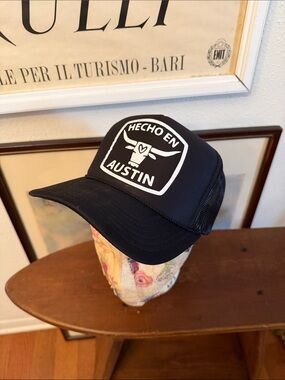 House of Shan Hecho En Austin Black Trucker Hat
